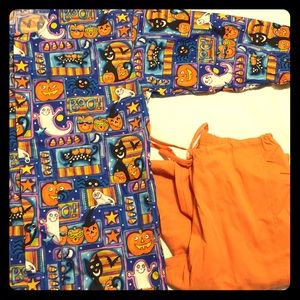 Halloween scrub jacket and pants.